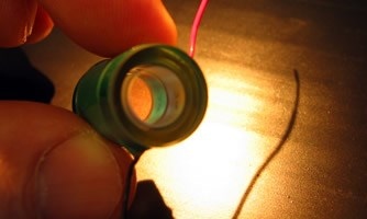 A tunable Fabry Perot uses piezoelectric cylinders to adjust the size of the air gap and sweep the peaks of the etalon.
