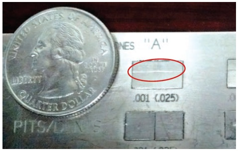 0.001” scratch on visual comparison standard.