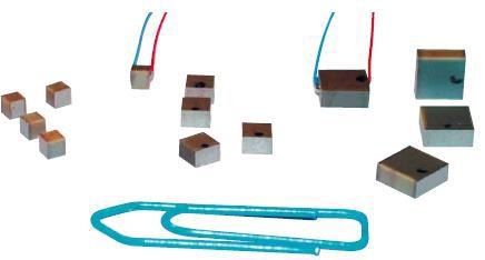 PICMA® chip miniature piezo actuators are the smallest ceramic encapsulated multilayer piezo actuators available, paper clip for size comparison.
