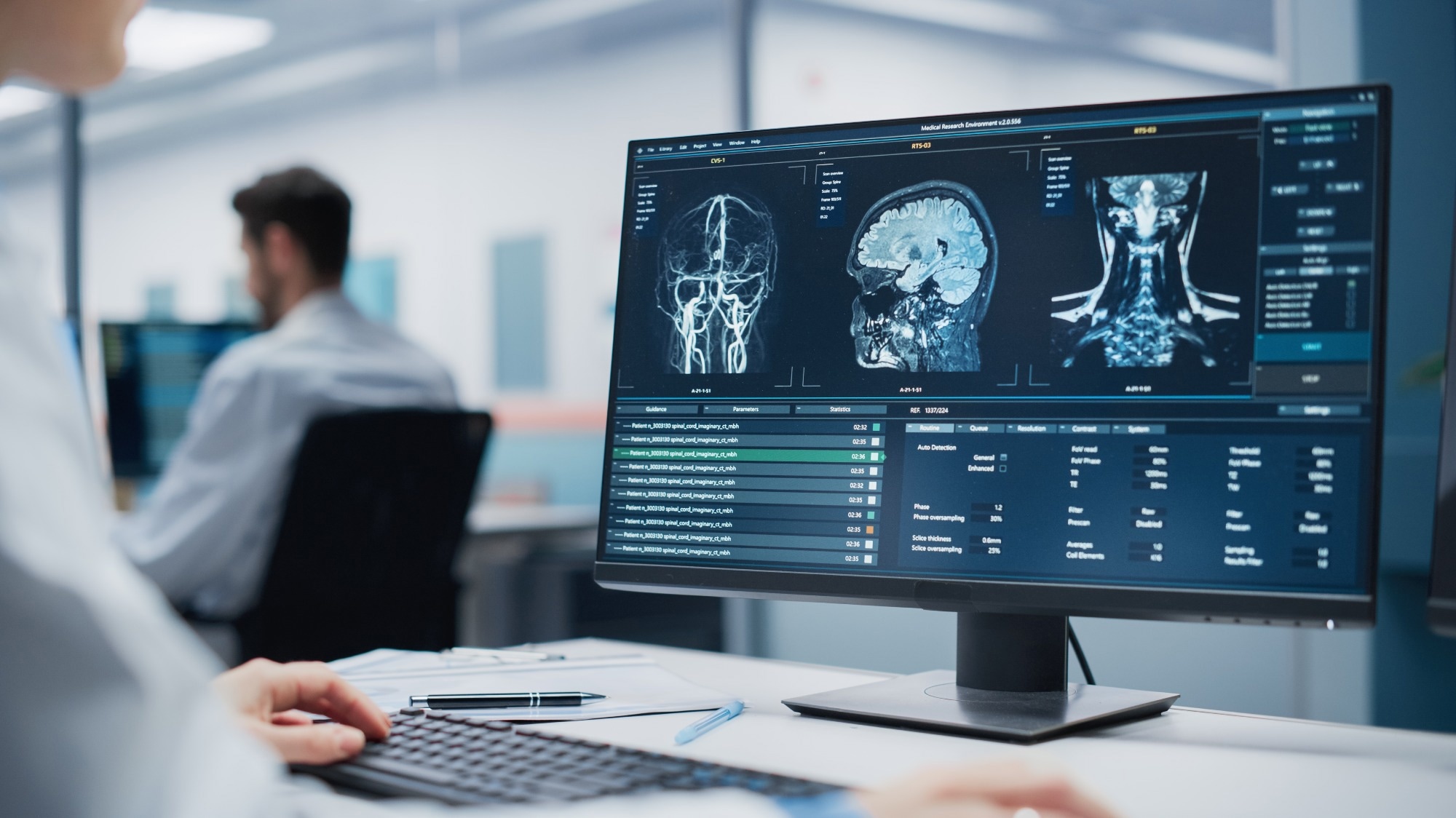 Medical Hospital Research Lab: Female Neurosurgeon Using Computer with Brain Scan