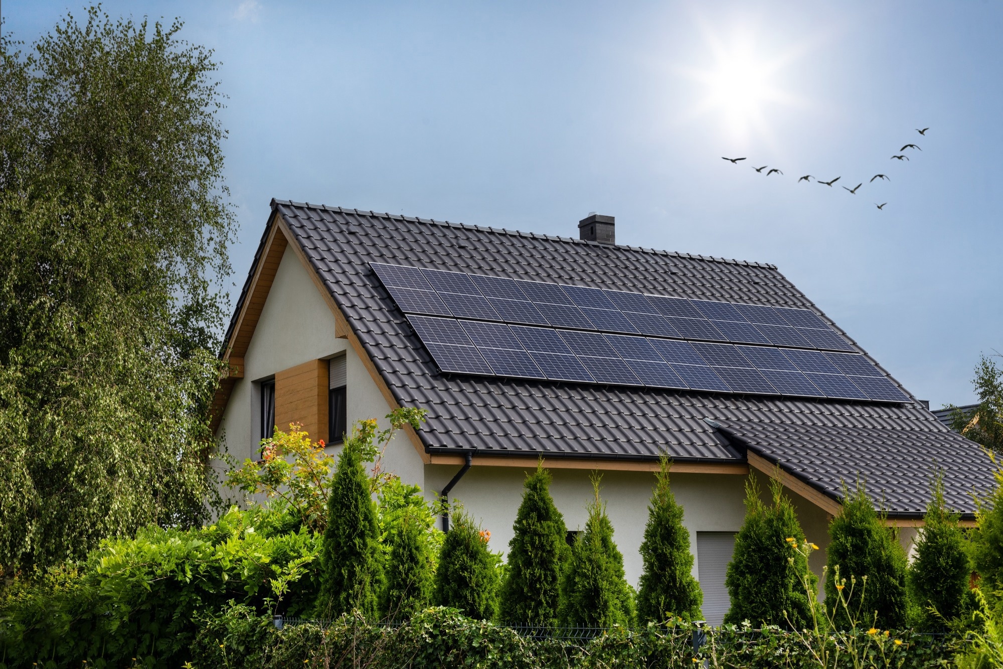 House with Solar Panels on Roof