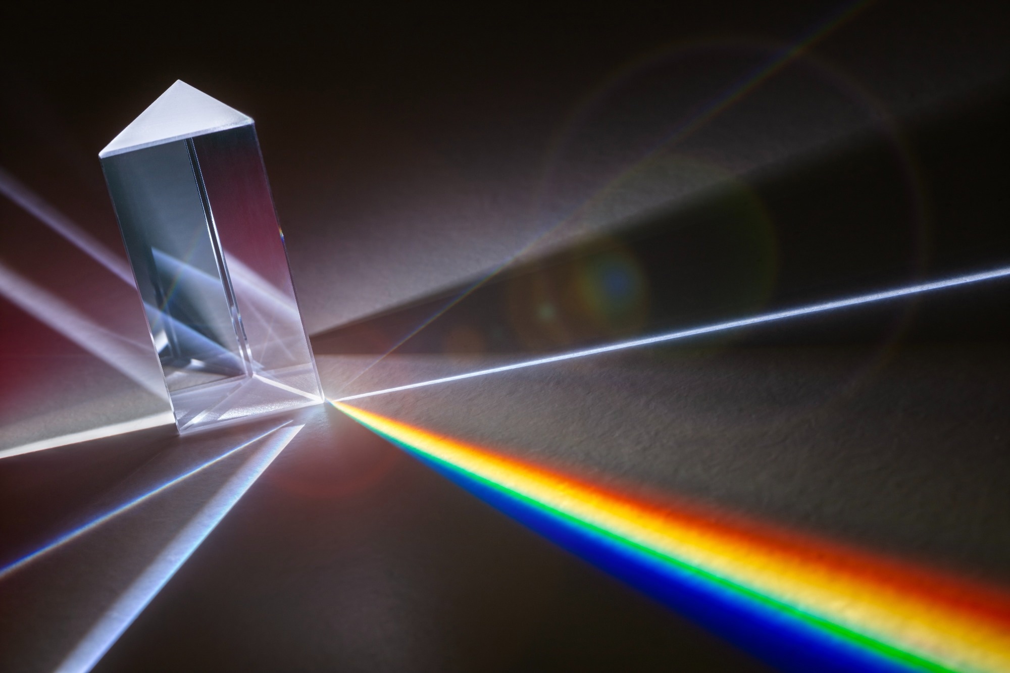 A picture of a prism revealing a spectrum