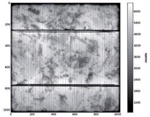 Electroluminescence image of a multicrystalline 12:5 x 12:5 cm2 cell at 20mA/cm2 excitation current density and exposure time of 10s.