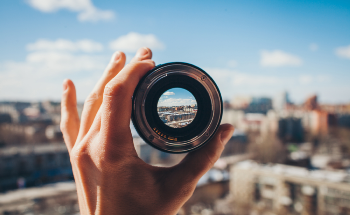 Ultra-Thin Camera Lenses for Broadband Long-Wave Infrared (LWIR) Imaging