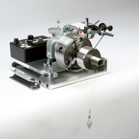 (a) Typical string method assembly with test shaft mounted. (b) Shaft is rotated both clockwise and counterclockwise to inspect string traverse. (c) Distance of string traveled is measured with verneers.
