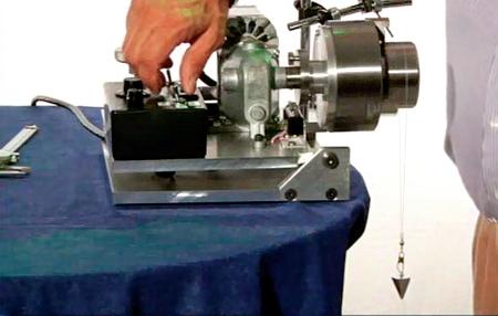 (a) Typical string method assembly with test shaft mounted. (b) Shaft is rotated both clockwise and counterclockwise to inspect string traverse. (c) Distance of string traveled is measured with verneers.