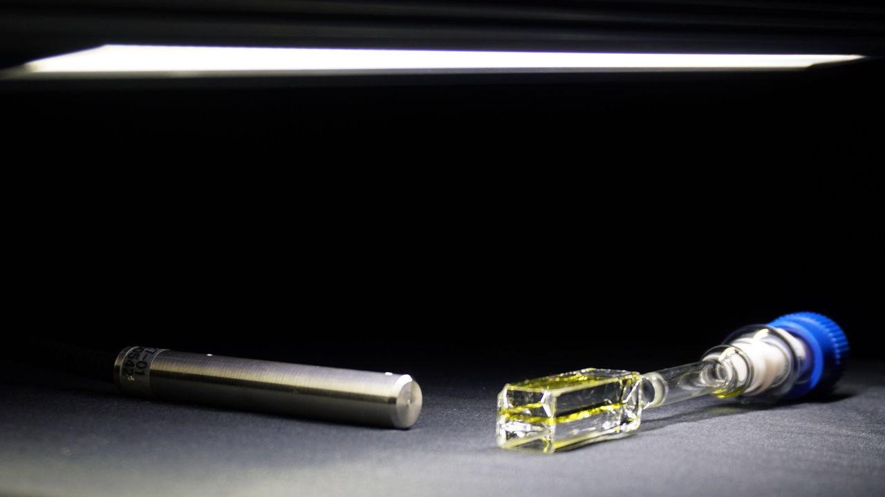 New System for Efficient Conversion of Weak Visible Light into UV Light