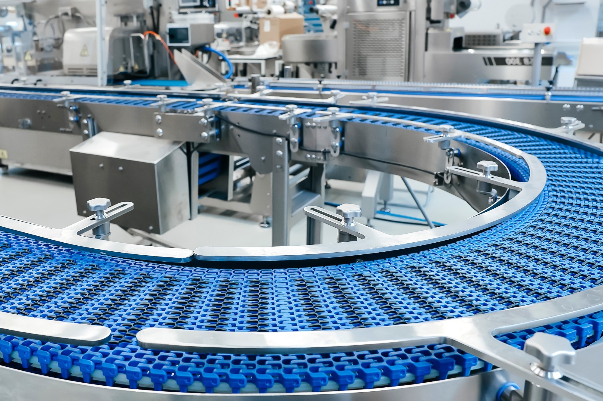 Empty modern conveyor belt of production line, part of industrial equipment in factory plant. Automatic system line