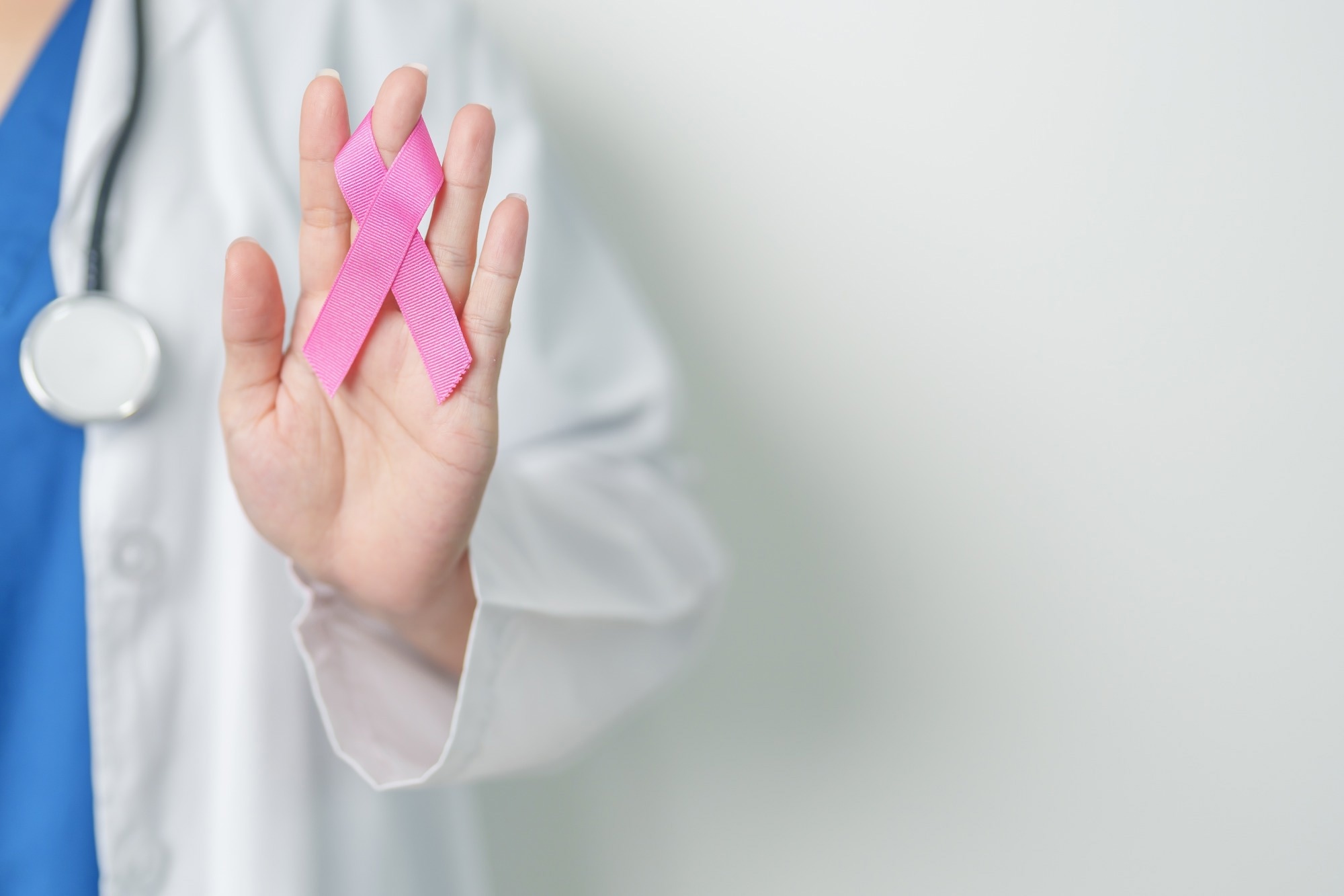 doctor with pink Ribbon in hospital