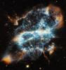 Planetary Nebula NGC 5198 Resembles a Brightly Colored Ribbon in Space