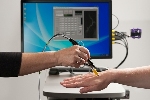 Mini-Microscope Noninvasively Detects Circulating Tumor Cells