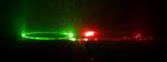 Intensity of Fluorescent-Protein-Based Lasers are Maximized by Solid-State Proteins