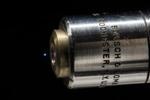 Broadband Terahertz Radiation Can Be Laser-Generated from Microplasma in Air