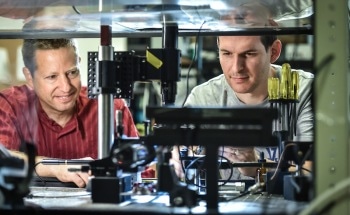 Interaction of Light and Water Waves Result in Laser Emissions