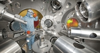 Challenging Aspheric Lenses for Nuclear Research