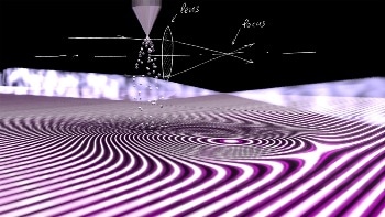 First-Ever Refractive Lens Formed by Jet of Atoms Focuses Extreme Ultraviolet Beams