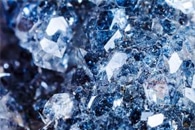 Using Lasers to Control the Movement of Nanodiamonds with Fluorescent Centers
