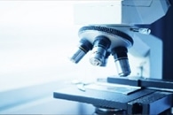 Microscopic Diamond Tracers can Provide Information via MRI and Optical Fluorescence Simultaneously