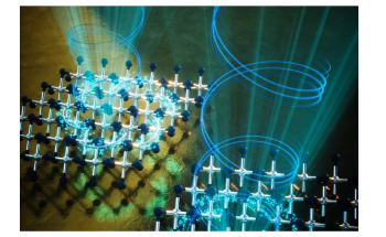 Polarized Light can Induce Asymmetrical Pattern in Exotic Materials