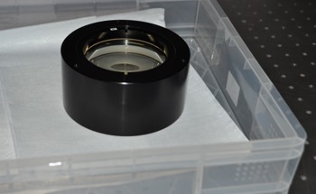 Large Output Beam Expander Optics for Interferometric Testing