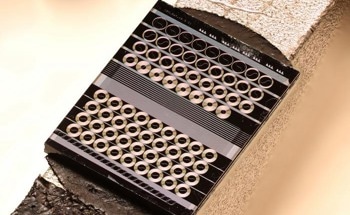 Miniaturized Photonic TWPA for High-Capacity Data Transmission